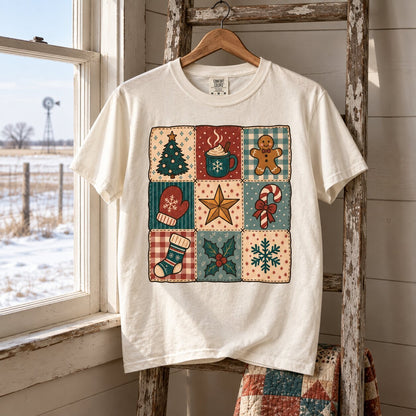 Vintage Christmas patchwork tee hanging on a wooden ladder beside a frosty window with a folded quilt below
